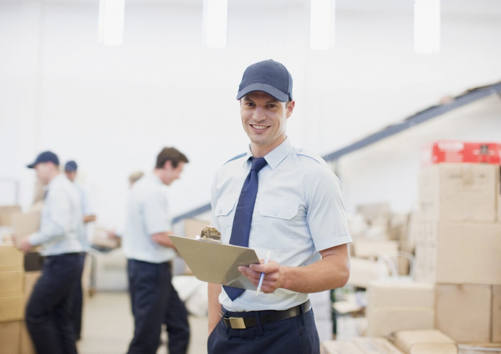 Customs brokers reviewing shipping documentation